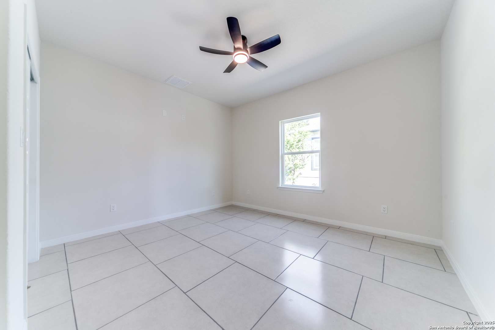 2962 Contour Drive Spring Branch, TX 78070 - Photo 15 of 26 a view of a livingroom with a ceiling fan and window