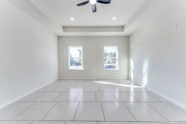 a view of an empty room and window