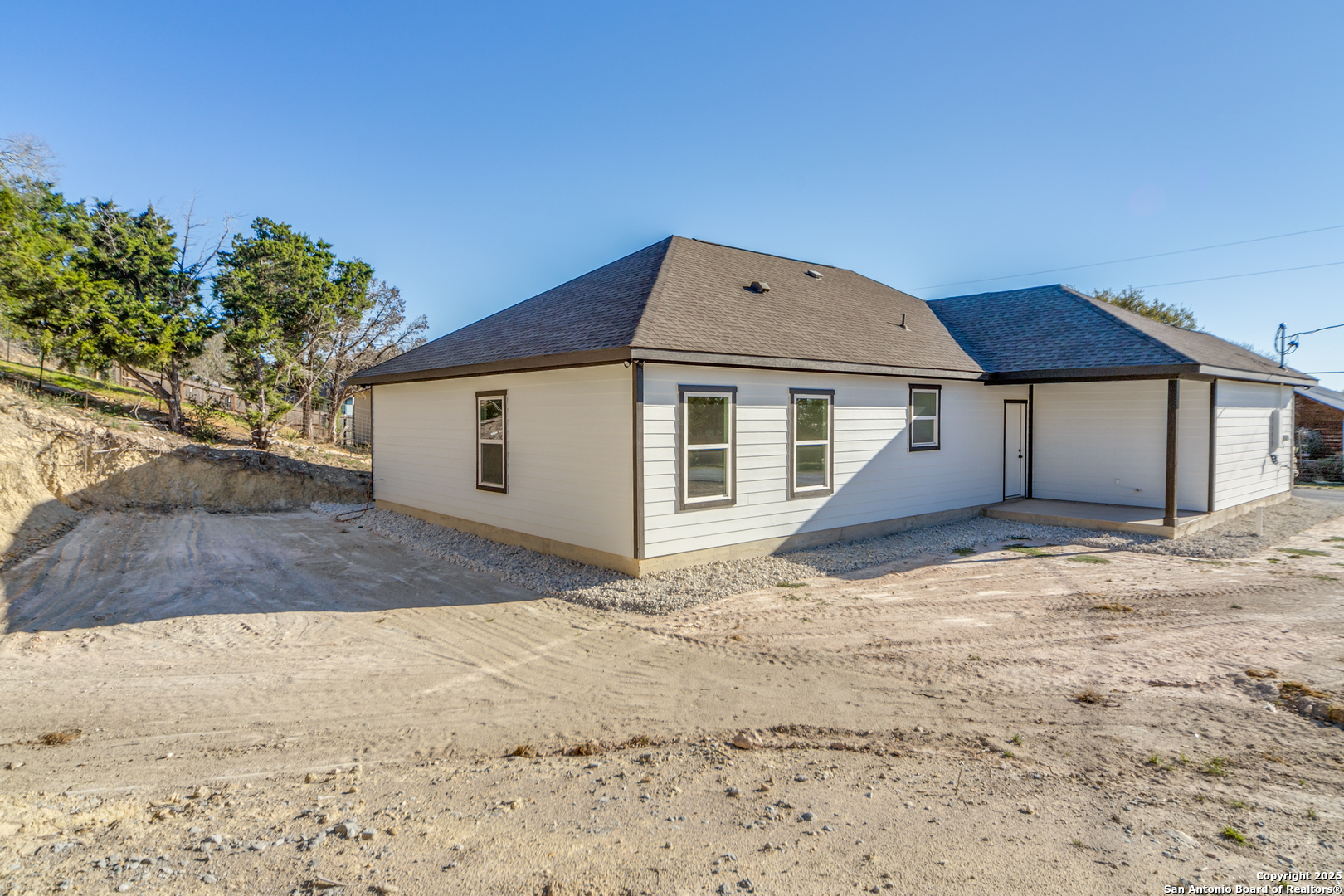 2962 Contour Drive Spring Branch, TX 78070 - Photo 26 of 26 a view of a house with a yard