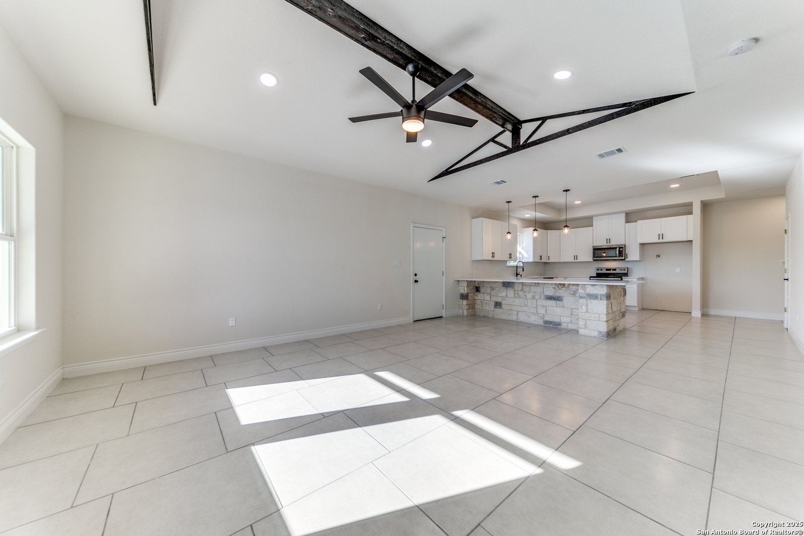 2962 Contour Drive Spring Branch, TX 78070 - Photo 5 of 26 a view of kitchen and hall with wooden floor
