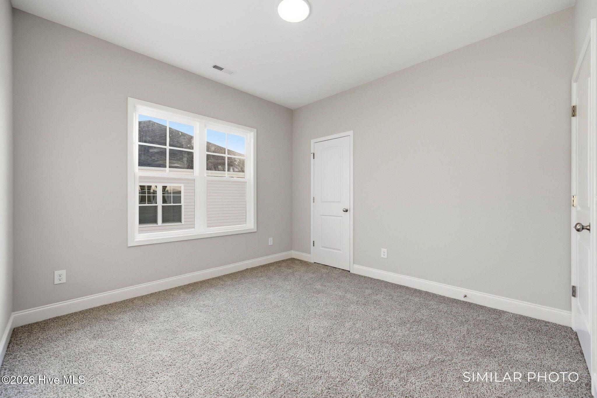207 Holly Sands Loop Sneads Ferry, NC 28460 - Photo 28 of 45 Similar Photo - Bedroom