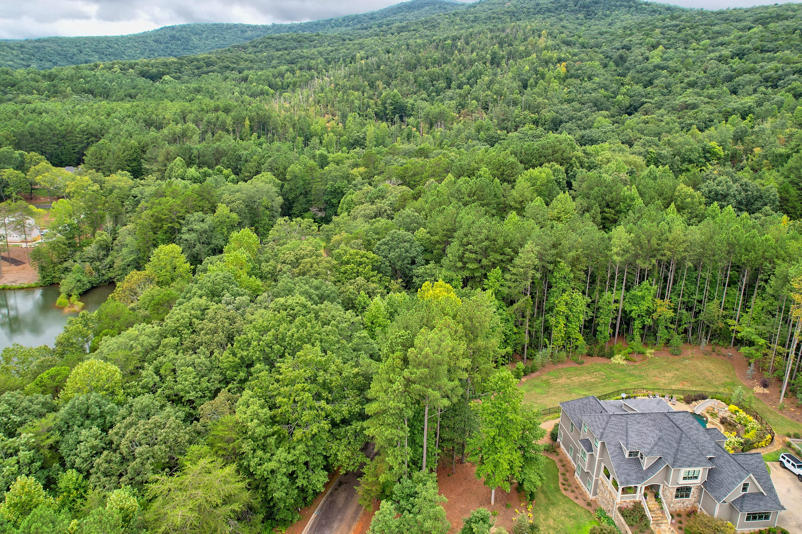 Lot 416 Yates Circle Clarkesville, GA 30523 - Photo 11 of 11 an aerial view of residential house with outdoor space and trees all around