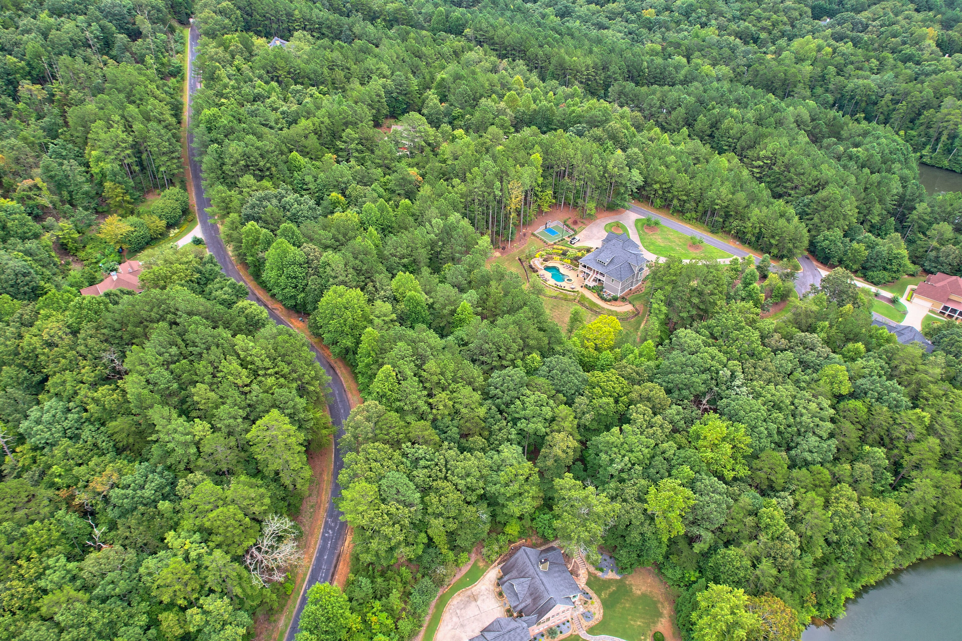 Lot 416 Yates Circle Clarkesville, GA 30523 - Photo 6 of 11 an aerial view of residential house with outdoor space and trees all around