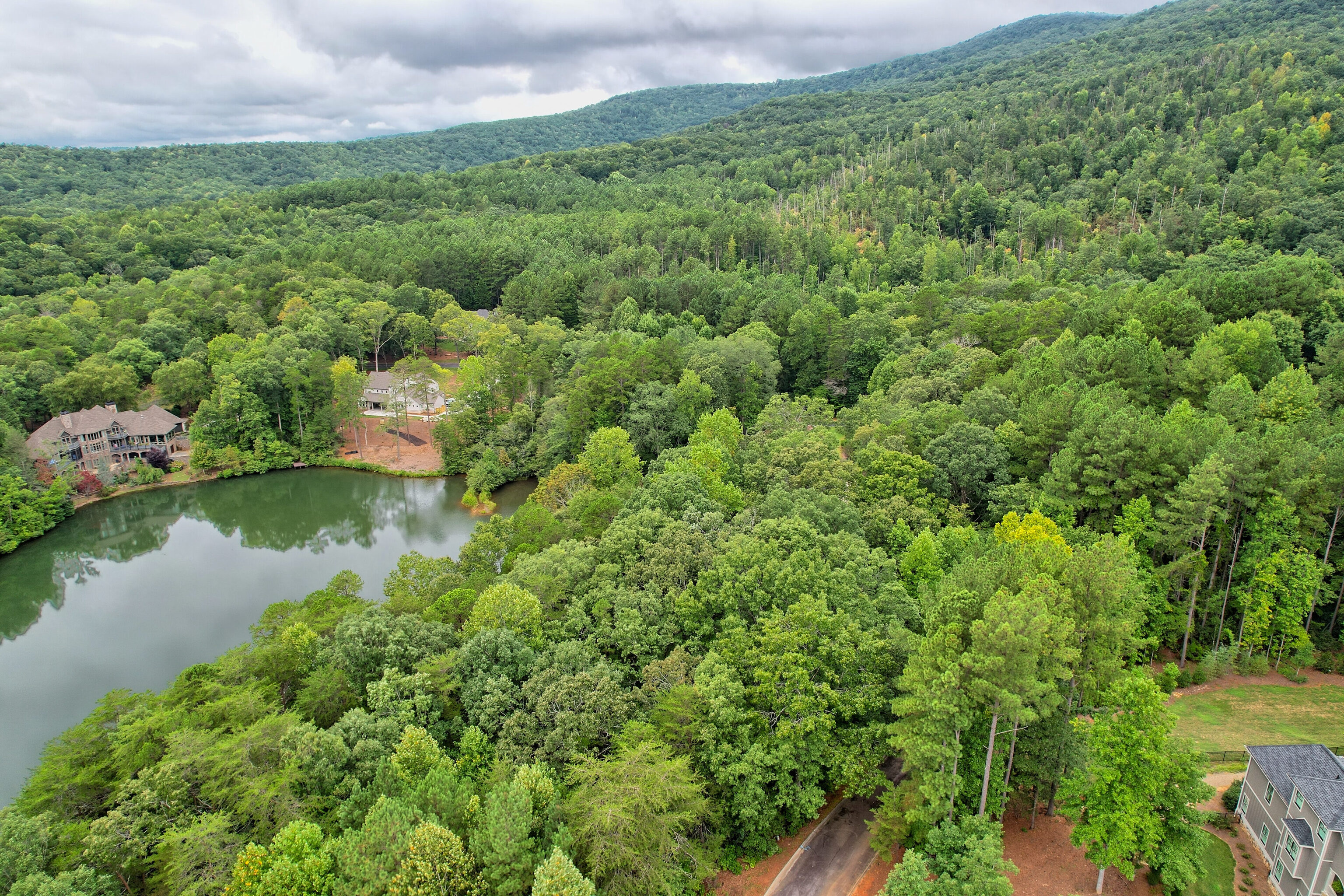 Lot 416 Yates Circle Clarkesville, GA 30523 - Photo 10 of 11 a view of a lake with a building in background
