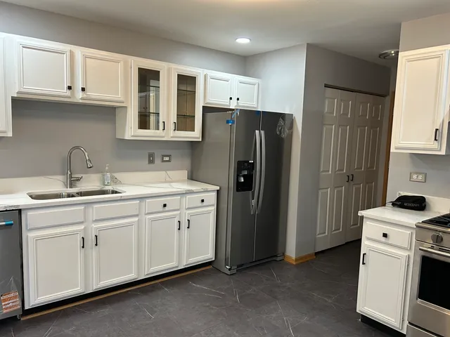 a bathroom with a toilet and a sink