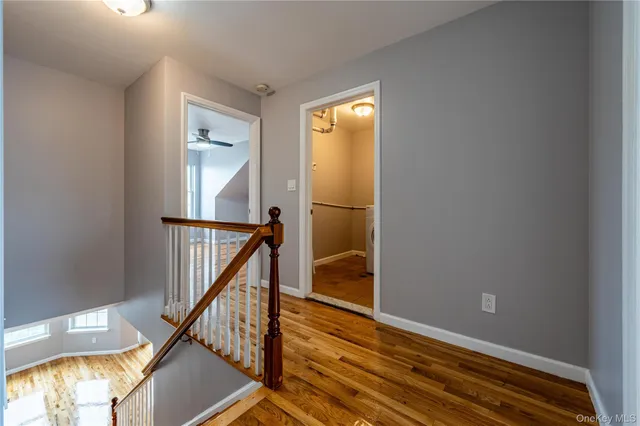 a view of entryway with wooden floor