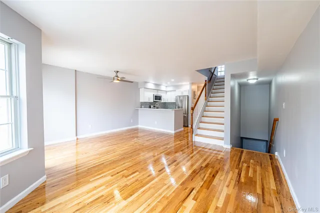 a view of a room with a wooden floor