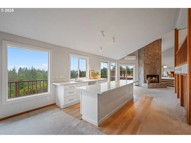 a view of a big yard with a house in the background