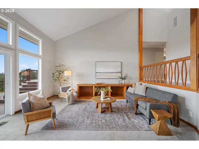 a spacious bedroom with a bed and a large window