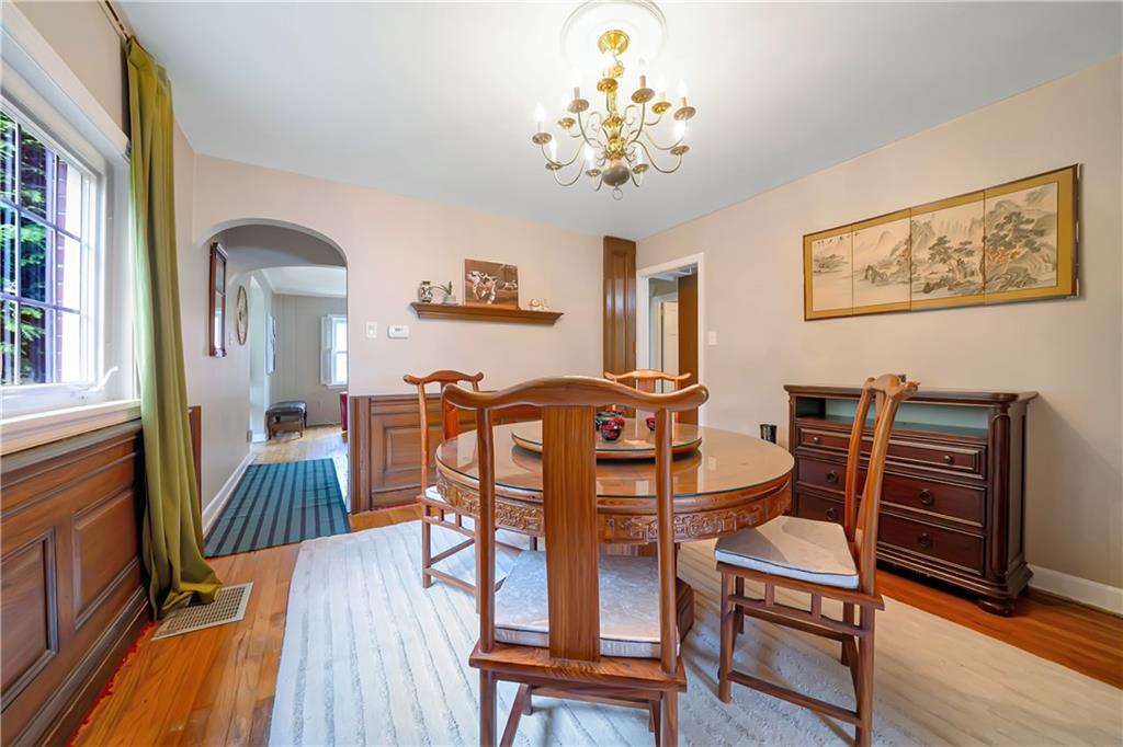 166 Spring Grove Road Pittsburgh, PA 15235 - Photo 11 of 41 a view of a dining room with furniture and wooden floor