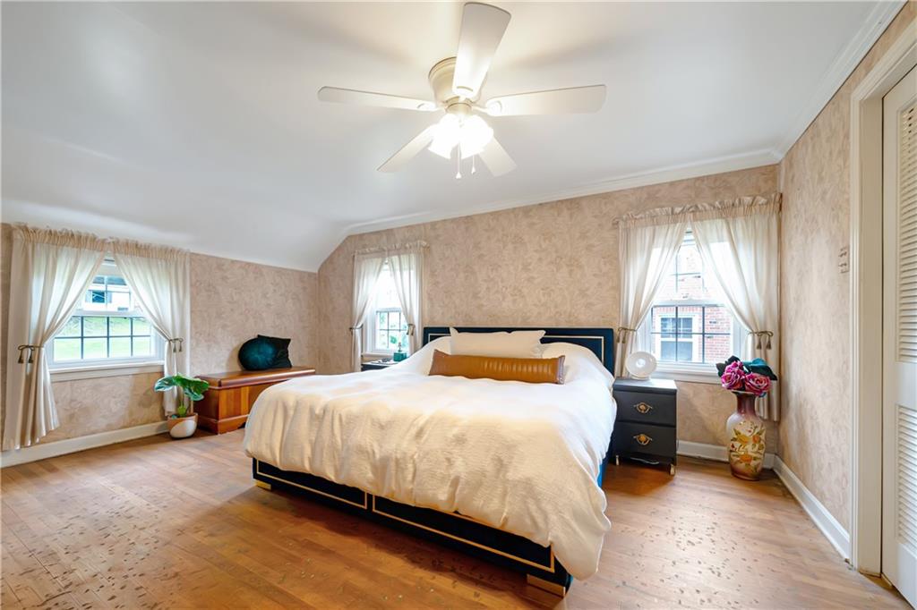 166 Spring Grove Road Pittsburgh, PA 15235 - Photo 19 of 41 a bedroom with a bed and a window