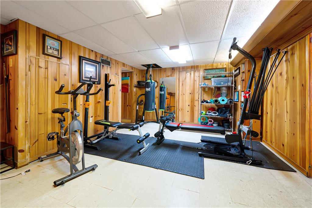 166 Spring Grove Road Pittsburgh, PA 15235 - Photo 29 of 41 a view of a room with gym equipment