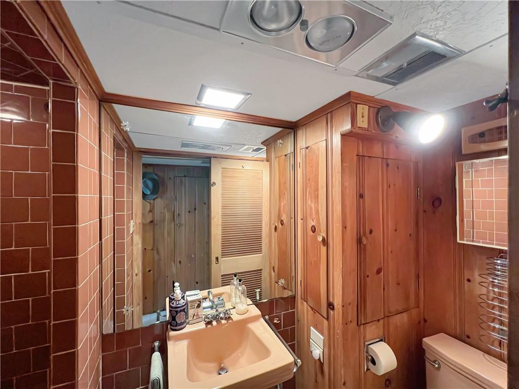 166 Spring Grove Road Pittsburgh, PA 15235 - Photo 31 of 41 a bathroom with a sink a toilet and shower