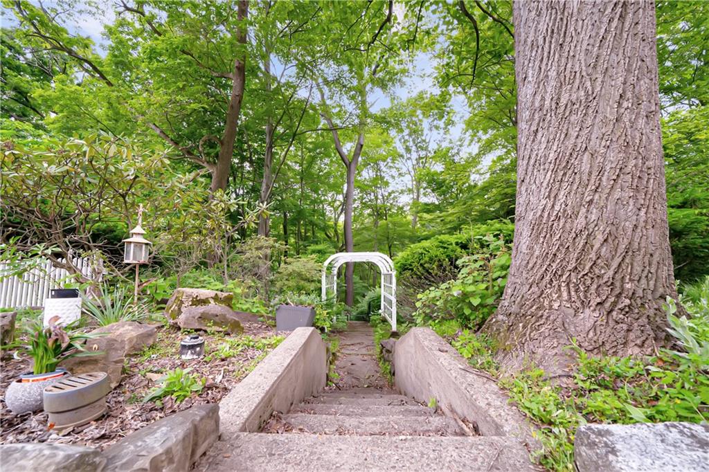 166 Spring Grove Road Pittsburgh, PA 15235 - Photo 35 of 41 a view of a table and chairs in patio