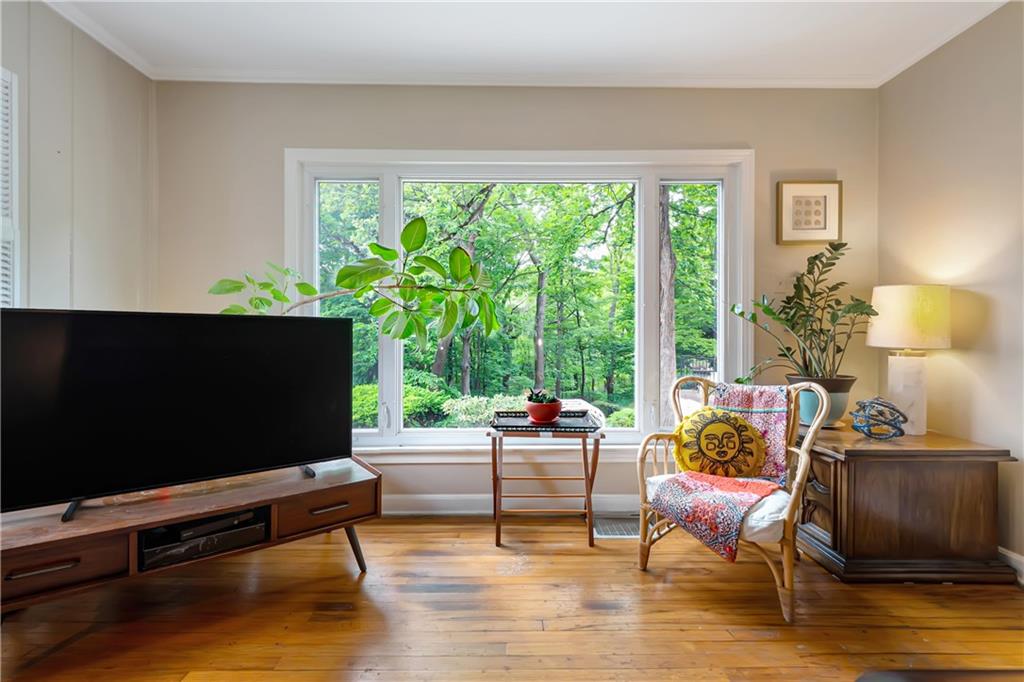 166 Spring Grove Road Pittsburgh, PA 15235 - Photo 6 of 41 a living room with furniture and a flat screen tv