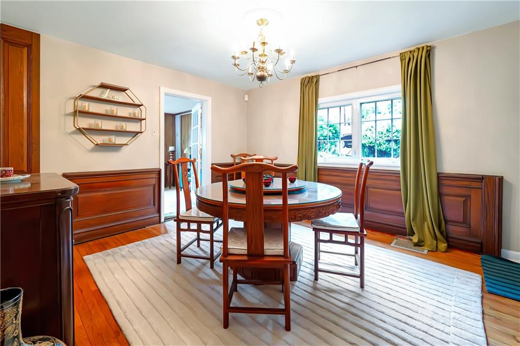 166 Spring Grove Road Pittsburgh, PA 15235 - Photo 9 of 41 a view of a dining room with furniture and wooden floor