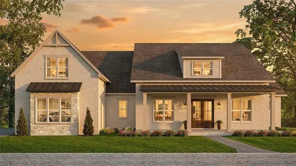 front view of a house with a yard