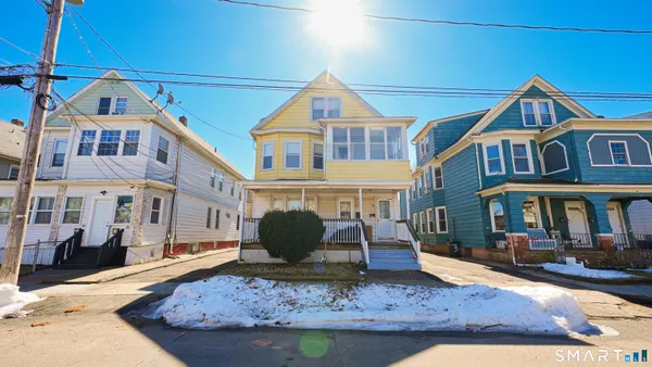a front view of a house with entertaining space
