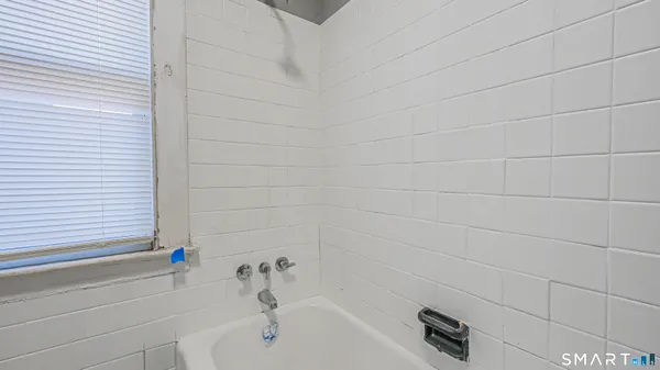 a bathroom with a bathtub