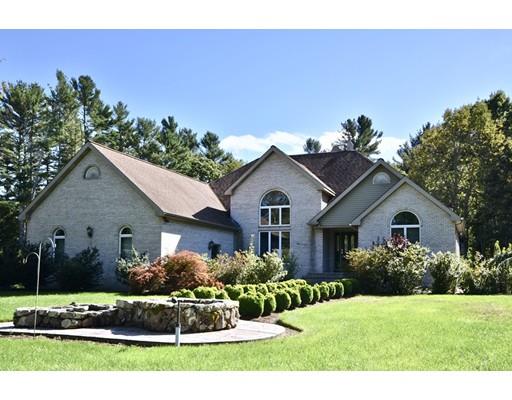 163 Gammons Road Acushnet, MA 02743 - Photo 1 of 22 a front view of a house with a garden