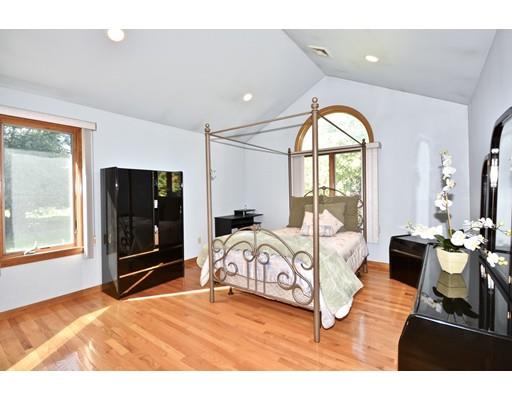 163 Gammons Road Acushnet, MA 02743 - Photo 12 of 22 a spacious bedroom with a bed and a large window