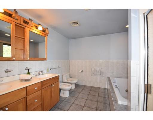 163 Gammons Road Acushnet, MA 02743 - Photo 14 of 22 a bathroom with a sink a toilet and a mirror