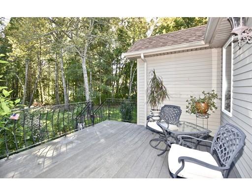 163 Gammons Road Acushnet, MA 02743 - Photo 18 of 22 a view of a chair and table in backyard of the house