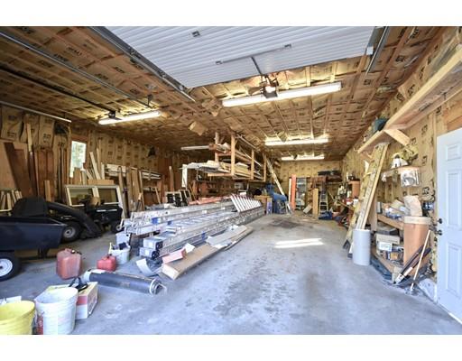 163 Gammons Road Acushnet, MA 02743 - Photo 4 of 22 a view of a room with gym equipment