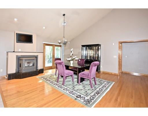 163 Gammons Road Acushnet, MA 02743 - Photo 9 of 22 a living room with furniture and a fireplace