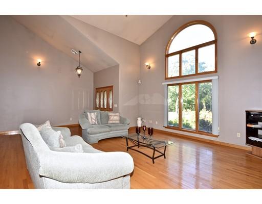 163 Gammons Road Acushnet, MA 02743 - Photo 10 of 22 a living room with furniture and a large window