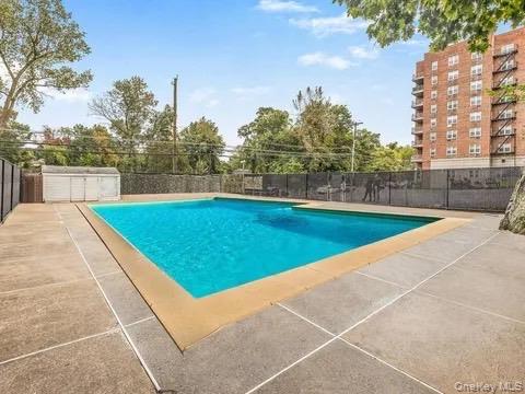 495 Odell Avenue, Unit 8R Yonkers, NY 10703 - Photo 21 of 27 View of pool with a patio
