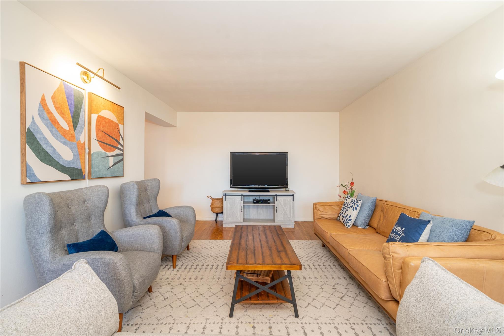 495 Odell Avenue, Unit 8R Yonkers, NY 10703 - Photo 4 of 27 Living area featuring wood finished floors