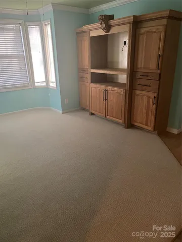 a room with furniture and window