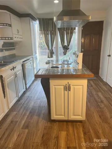 a view of living room with wooden floor