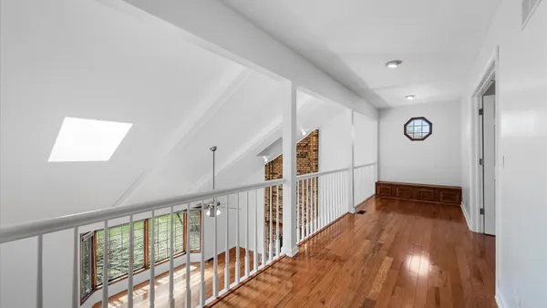 a bathroom with a shower and a toilet