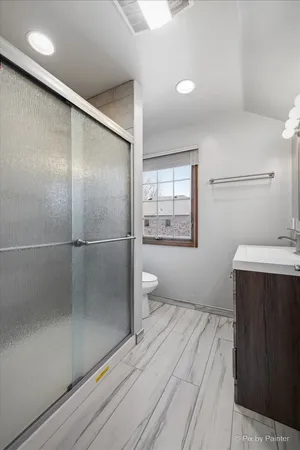 a bathroom with a sink and mirror