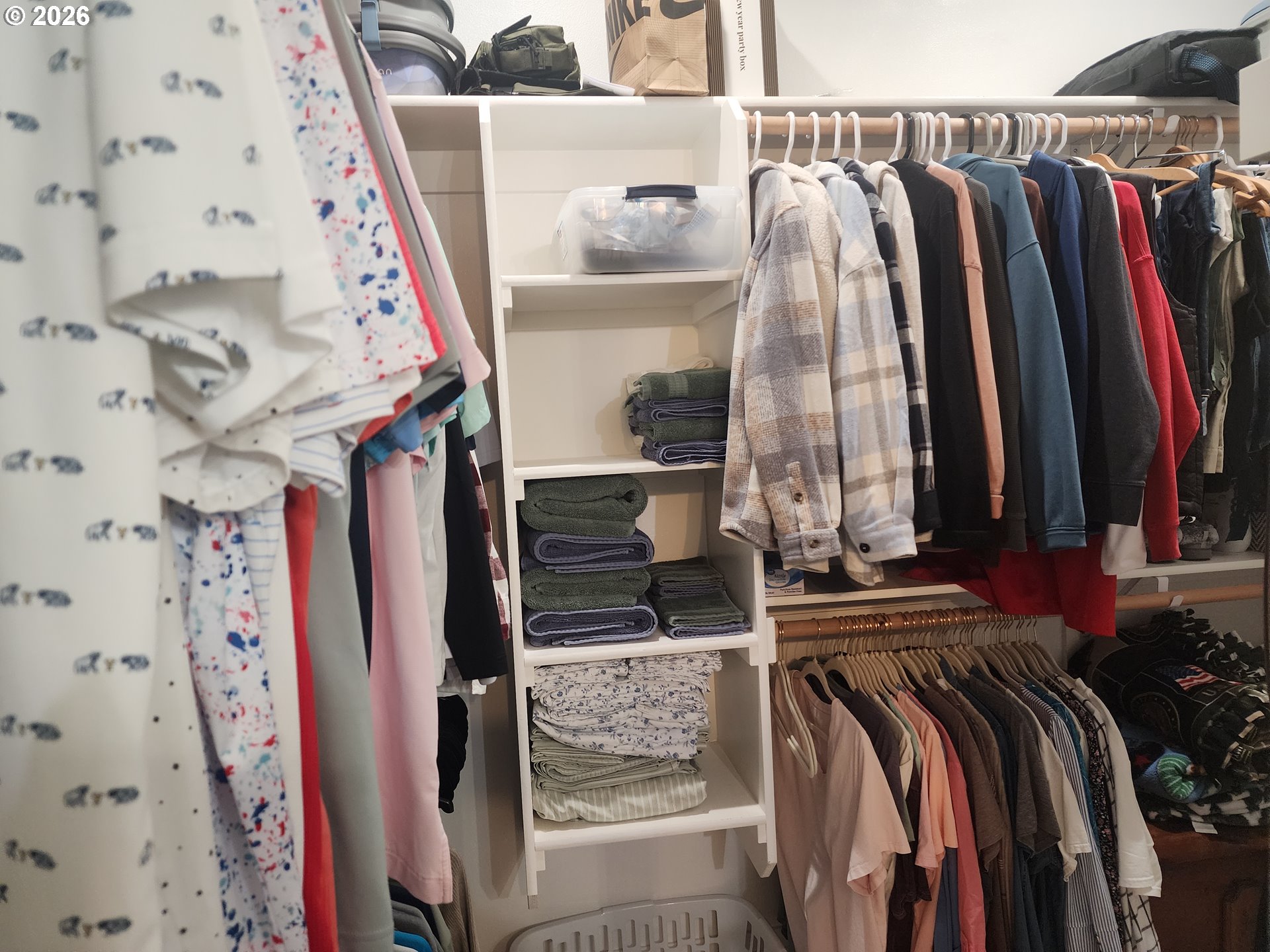845 1st Street Gervais, OR 97026 - Photo 16 of 29 a view of walk in closet with clothes and shoes
