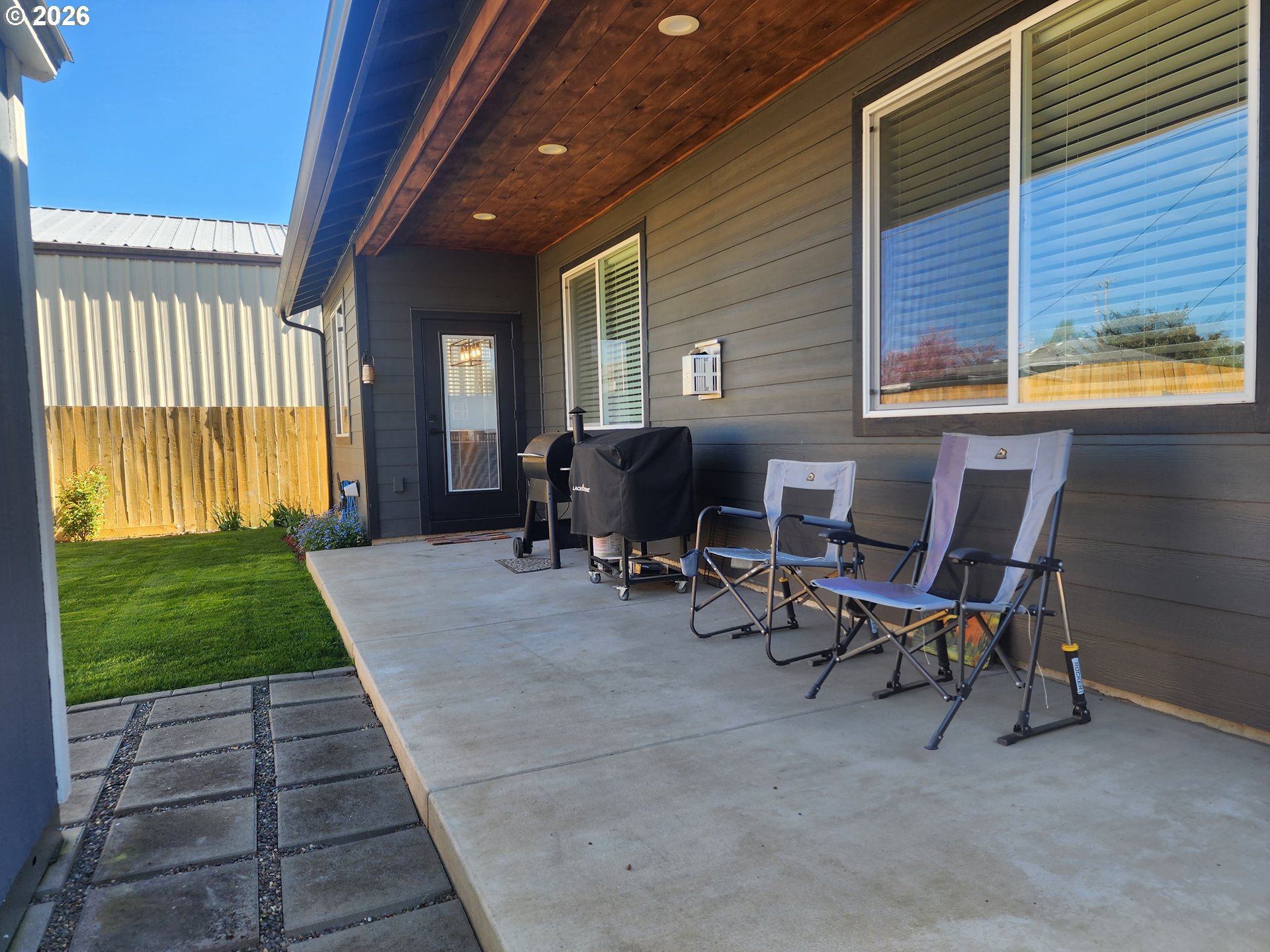 845 1st Street Gervais, OR 97026 - Photo 23 of 29 a view of a house with backyard and sitting area