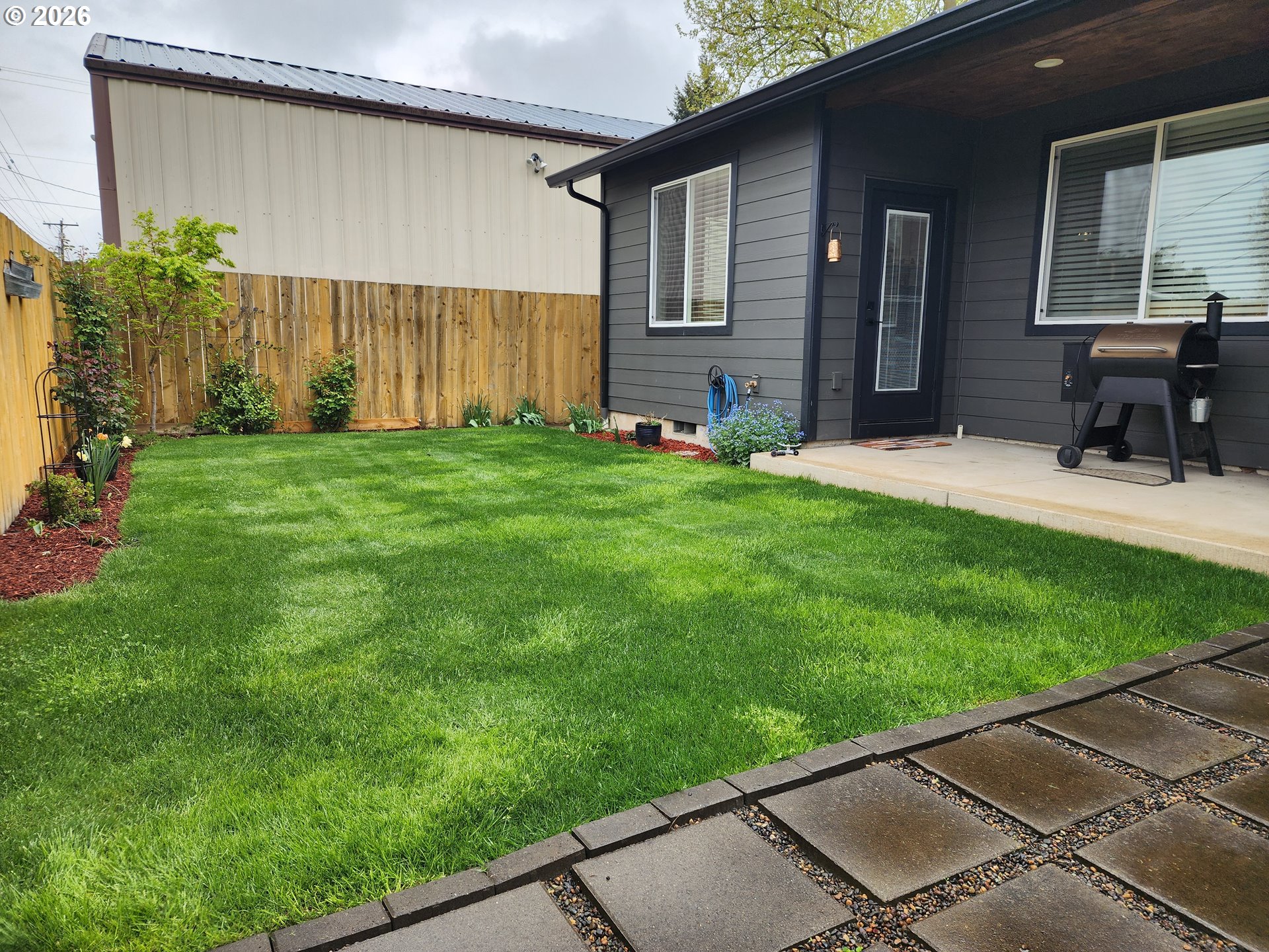845 1st Street Gervais, OR 97026 - Photo 24 of 29 a backyard of a house with seating space