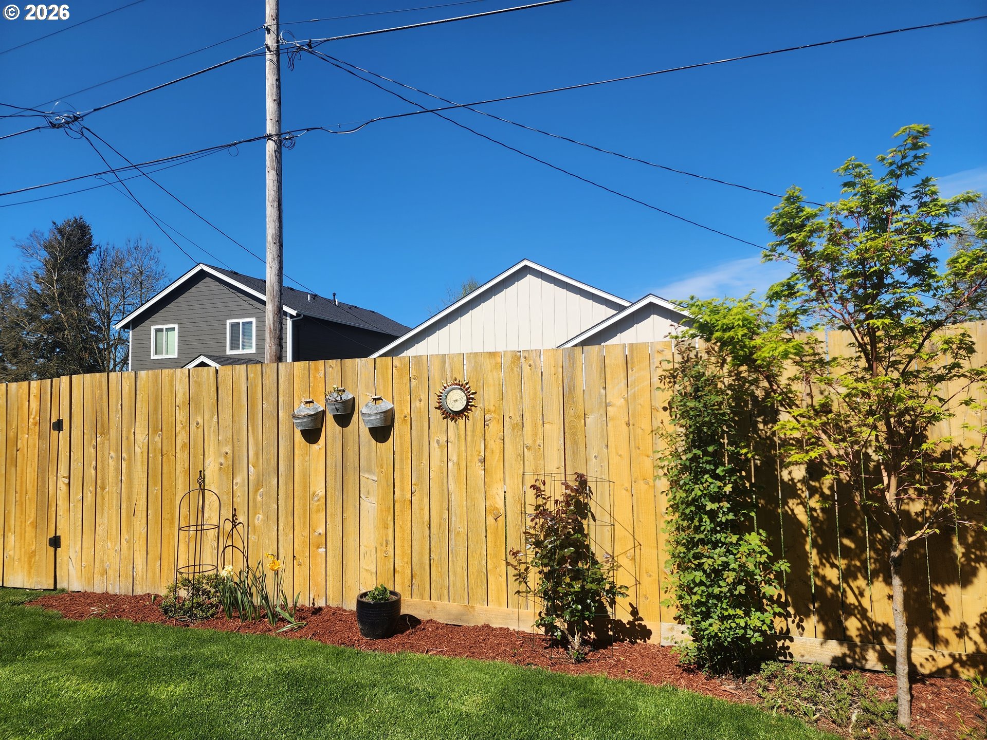 845 1st Street Gervais, OR 97026 - Photo 26 of 29 a front view of a house with garden