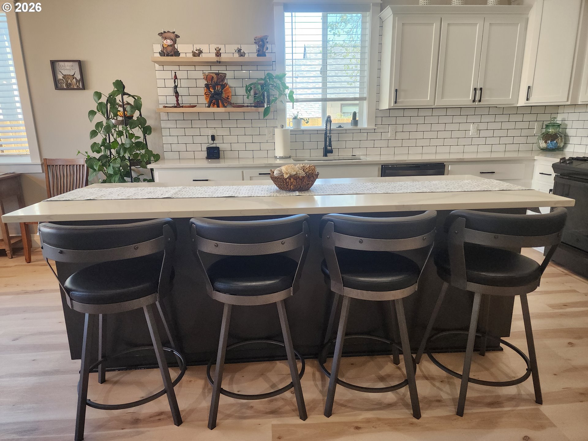 845 1st Street Gervais, OR 97026 - Photo 7 of 29 a kitchen with a sink and chairs