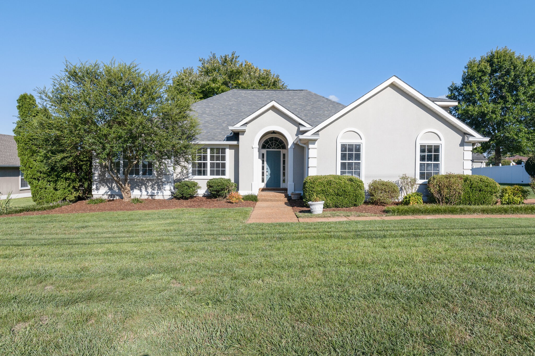 3648 Mahlon Moore Road Spring Hill, TN 37174 - Photo 1 of 30 a front view of a house with a yard and garage