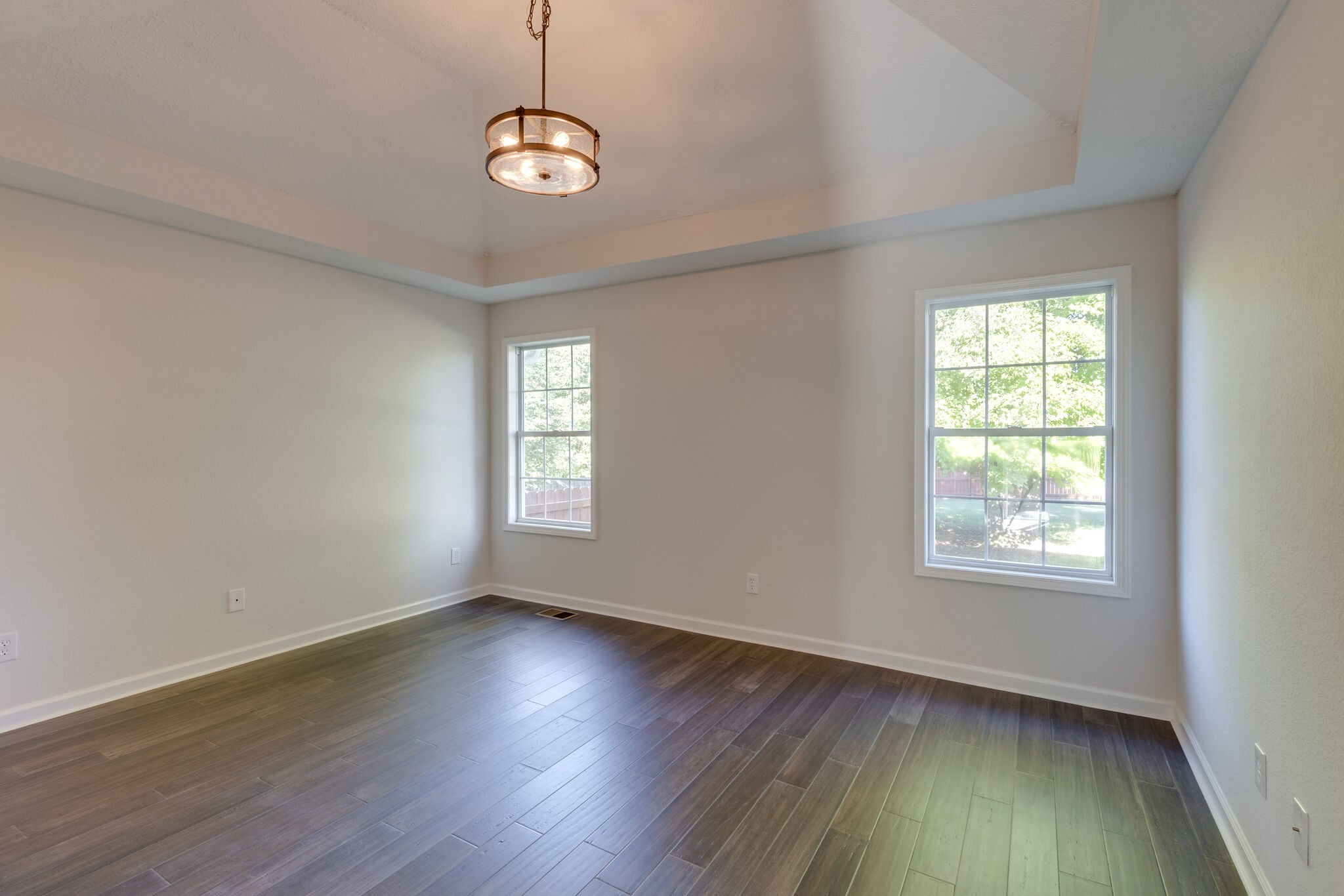 3648 Mahlon Moore Road Spring Hill, TN 37174 - Photo 16 of 30 a view of an empty room with wooden floor and a window