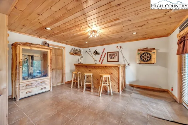 a view of a hall with wooden floor