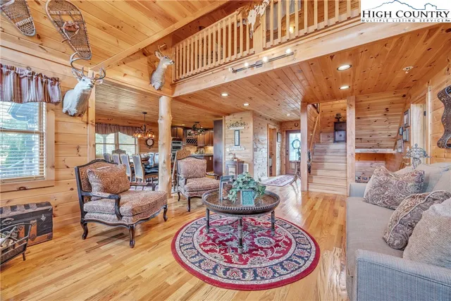 a view of a living room and entryway