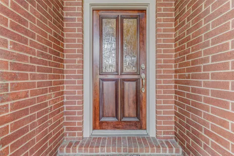 a view of a hallway with entryway