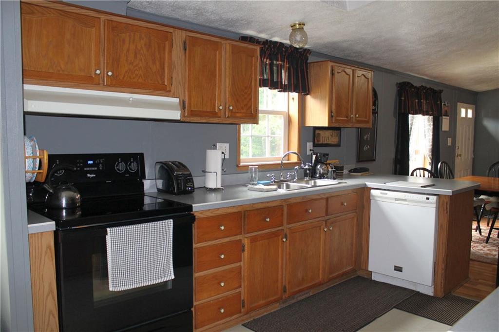 178 Stevens Pond Road Liberty, ME 04949 - Photo 9 of 24 Kitchen, looking back toward the...