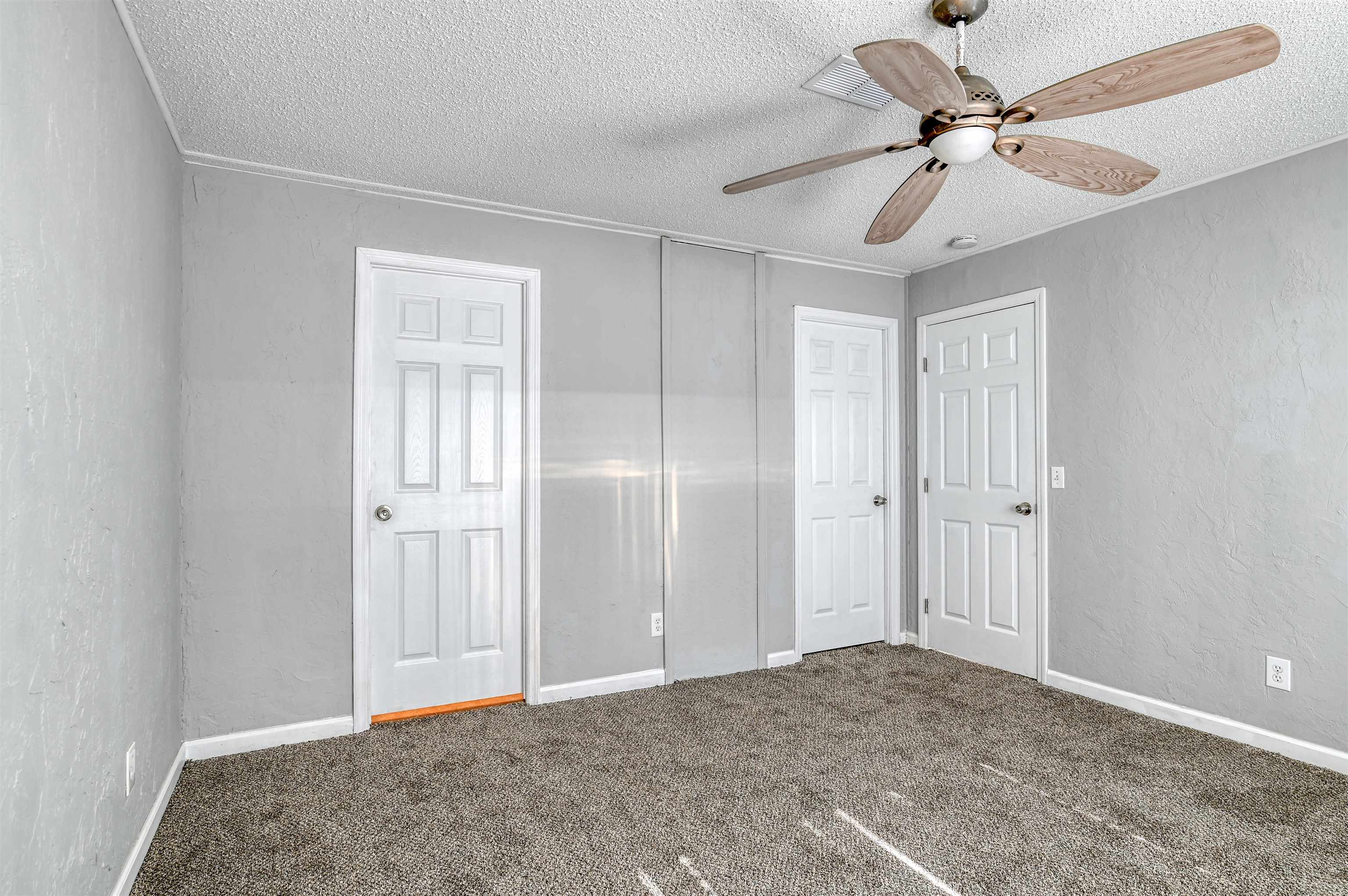 4661 Second Avenue St. Augustine, FL 32095 - Photo 14 of 26 a view of empty room with a ceiling fan