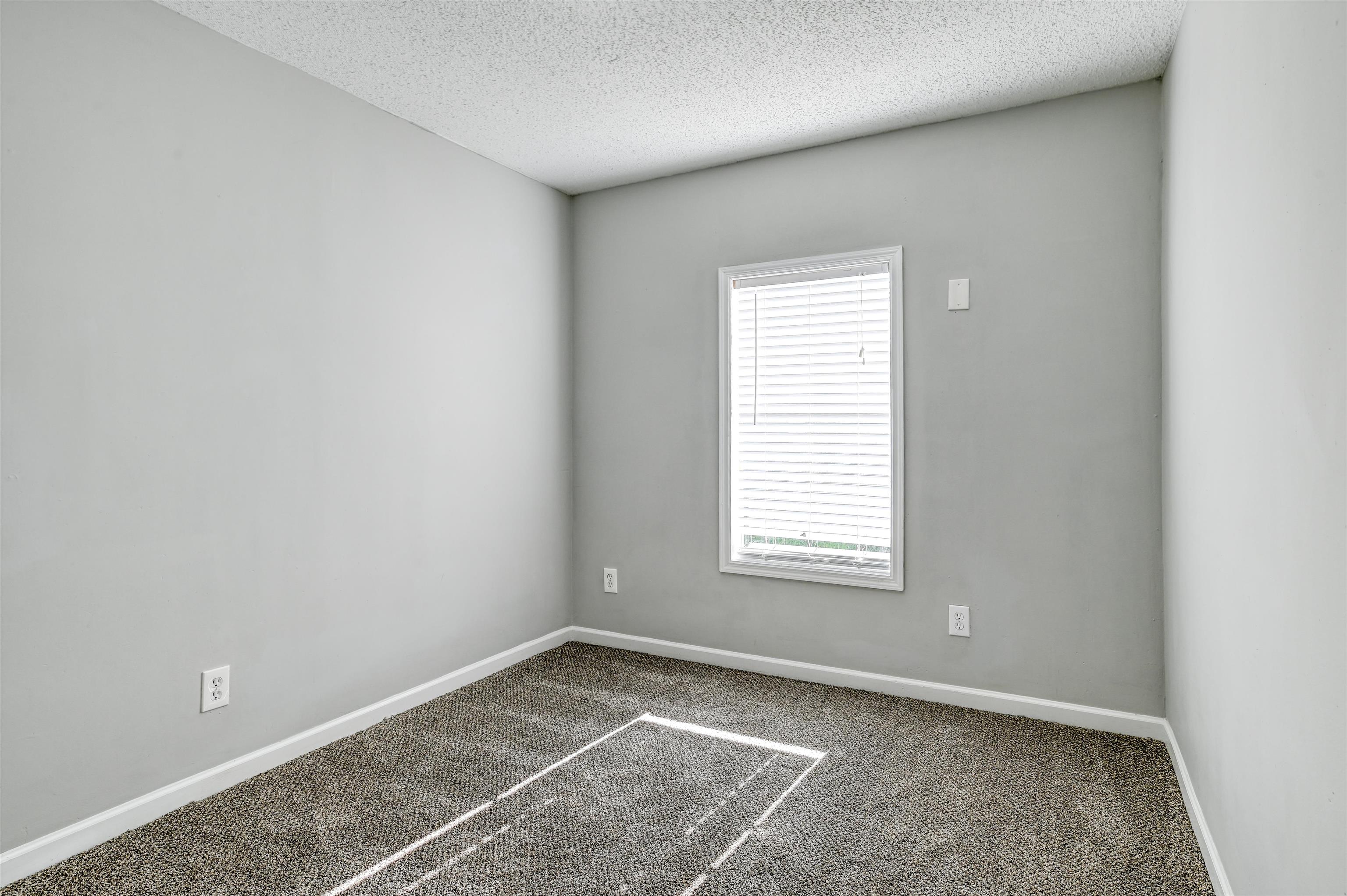 4661 Second Avenue St. Augustine, FL 32095 - Photo 17 of 26 an empty room with a window