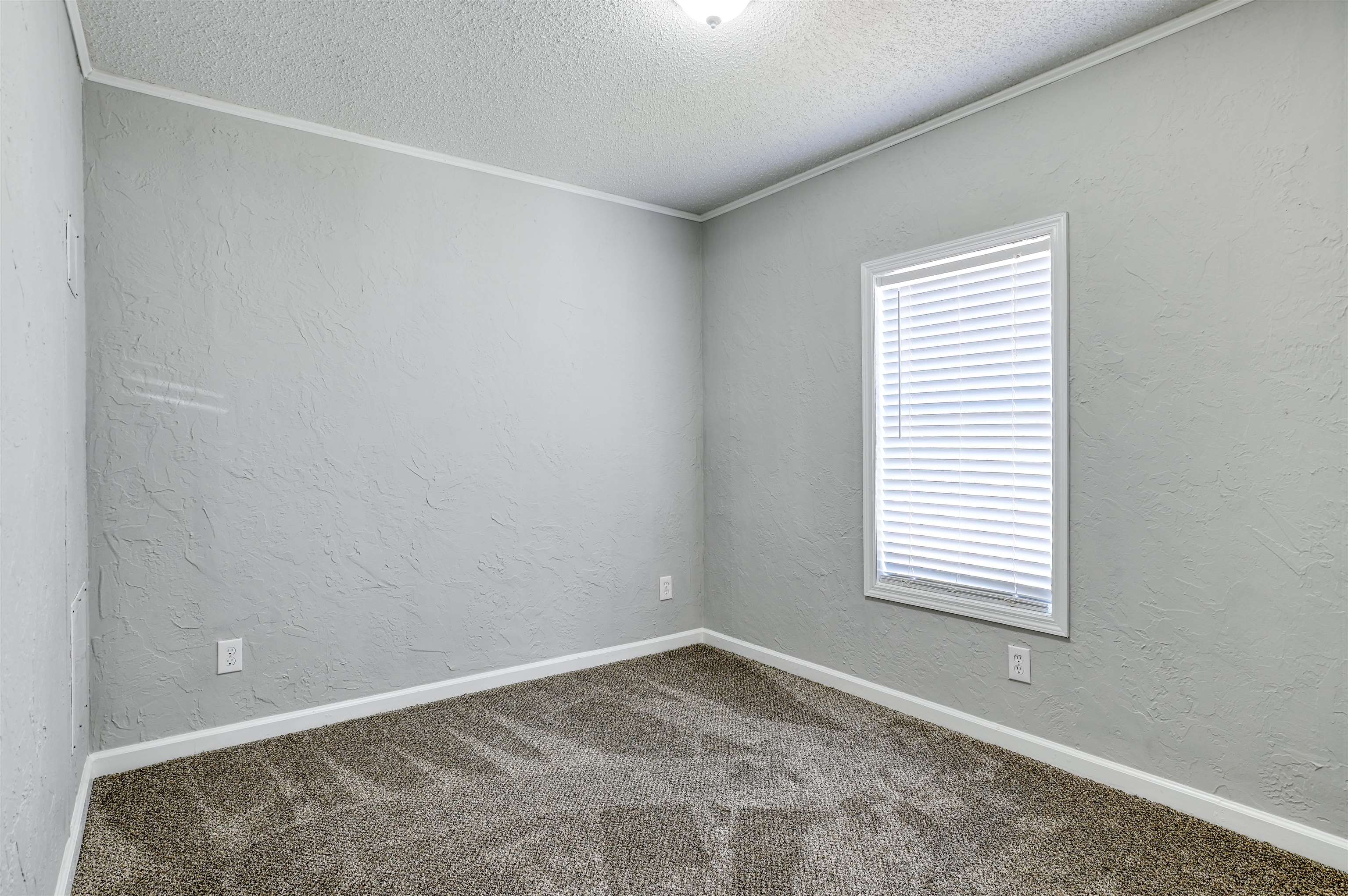 4661 Second Avenue St. Augustine, FL 32095 - Photo 19 of 26 an empty room with a window